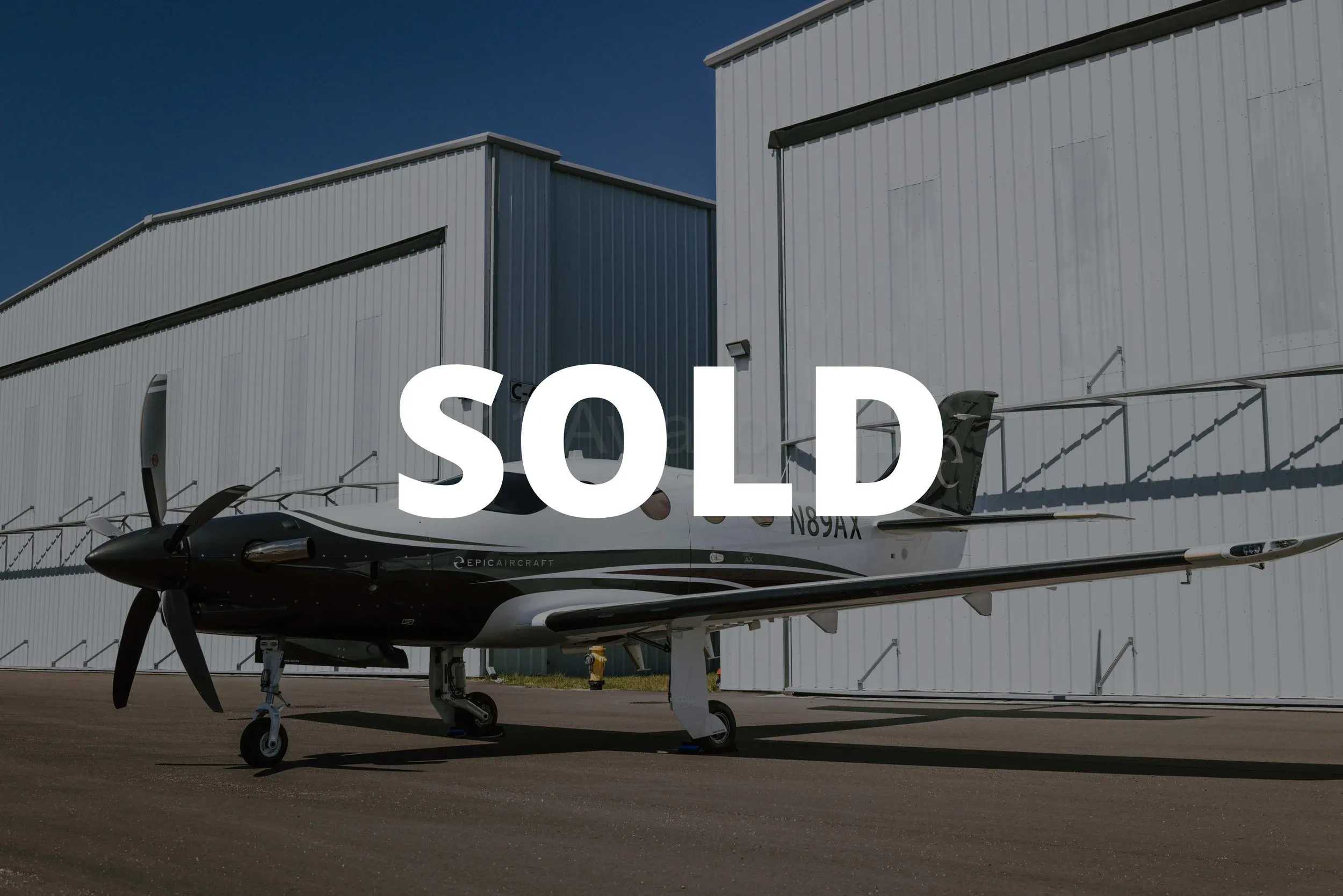 Exterior view of a 2025 Epic Aircraft E1000 AX, N89AX.