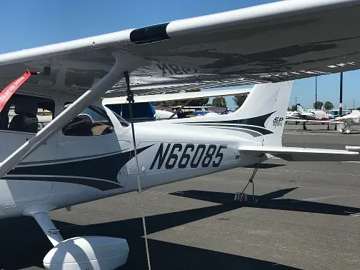 Exterior view of a 2004 Cessna 172SP, N66085.