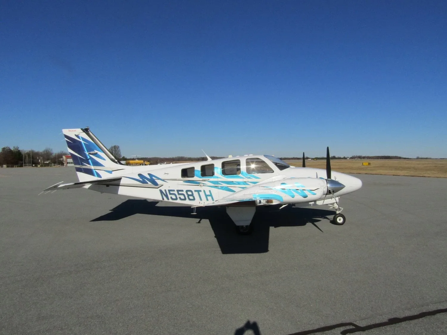 Exterior view of a Beechcraft Twin Piston Baron 55, N55BN.