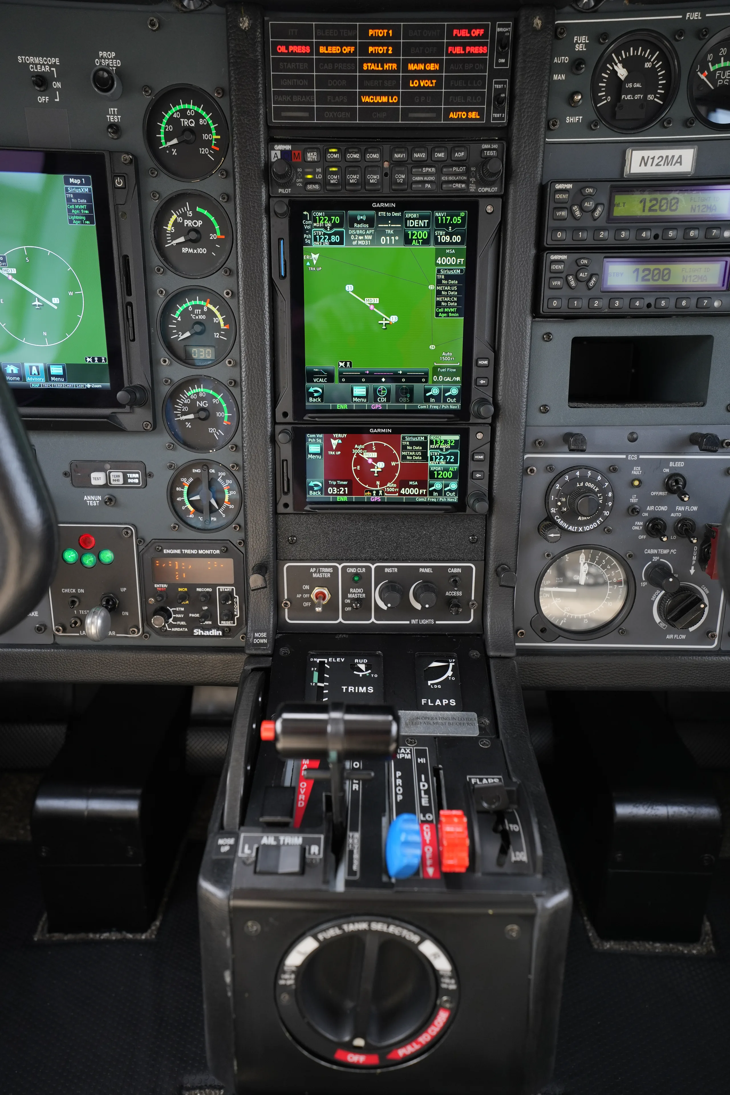 Cockpit and instrument panel of a 2005 Daher TBM 700C2, 318.