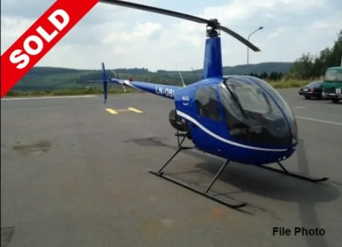 Exterior view of a 2005 Robinson R22 Beta II.