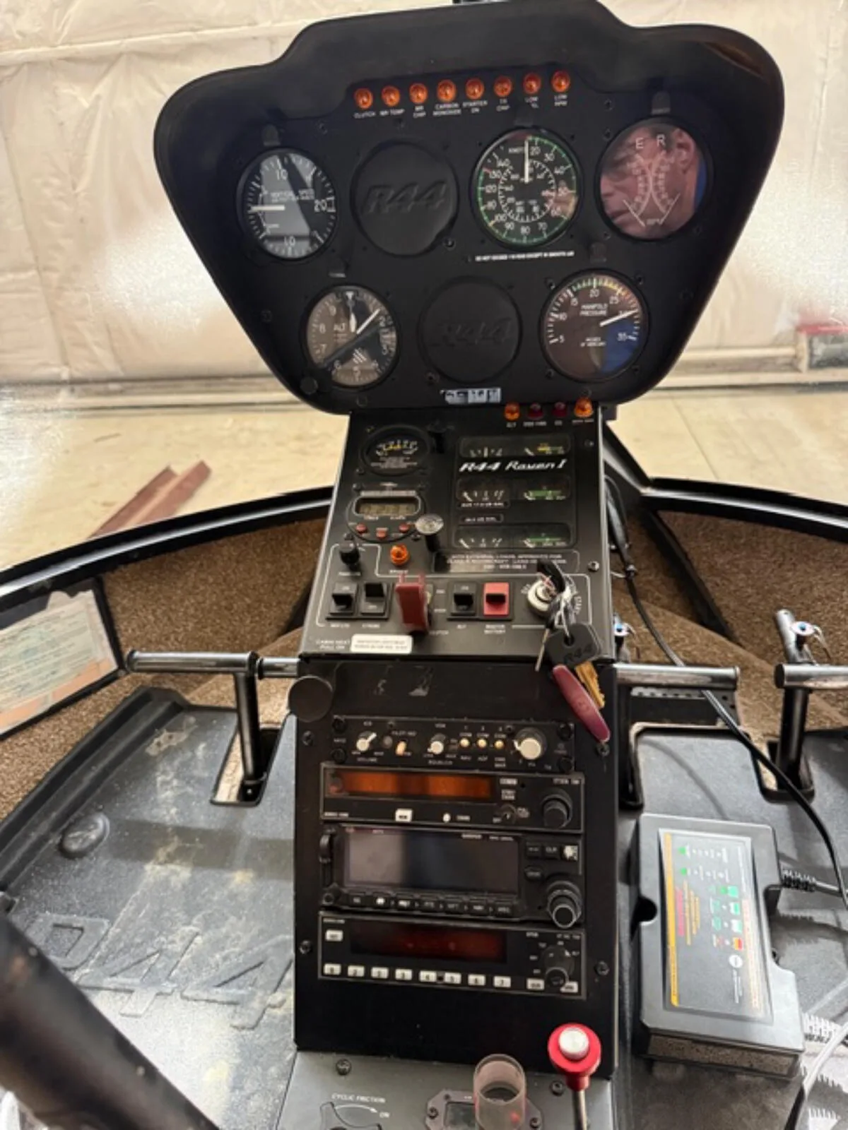 Cockpit and instrument panel of a 2003 Robinson R44 Raven.