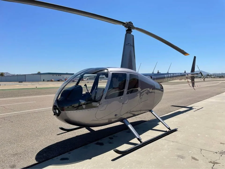 Exterior view of a 2015 Robinson R44 Raven II.