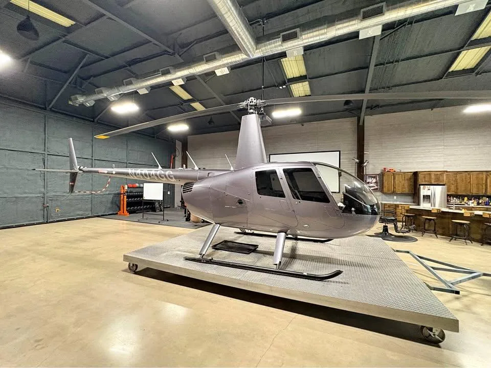 Exterior view of a 2015 Robinson R44 Raven II.