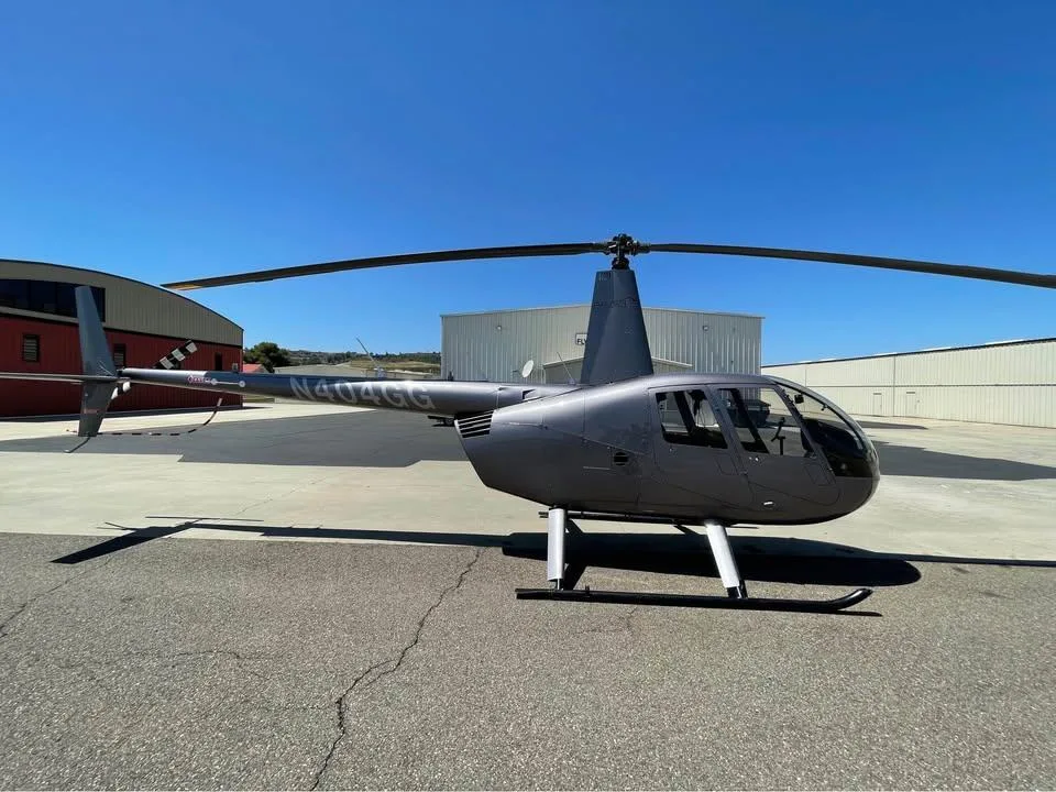 Marketing image of a 2015 Robinson R44 Raven II.