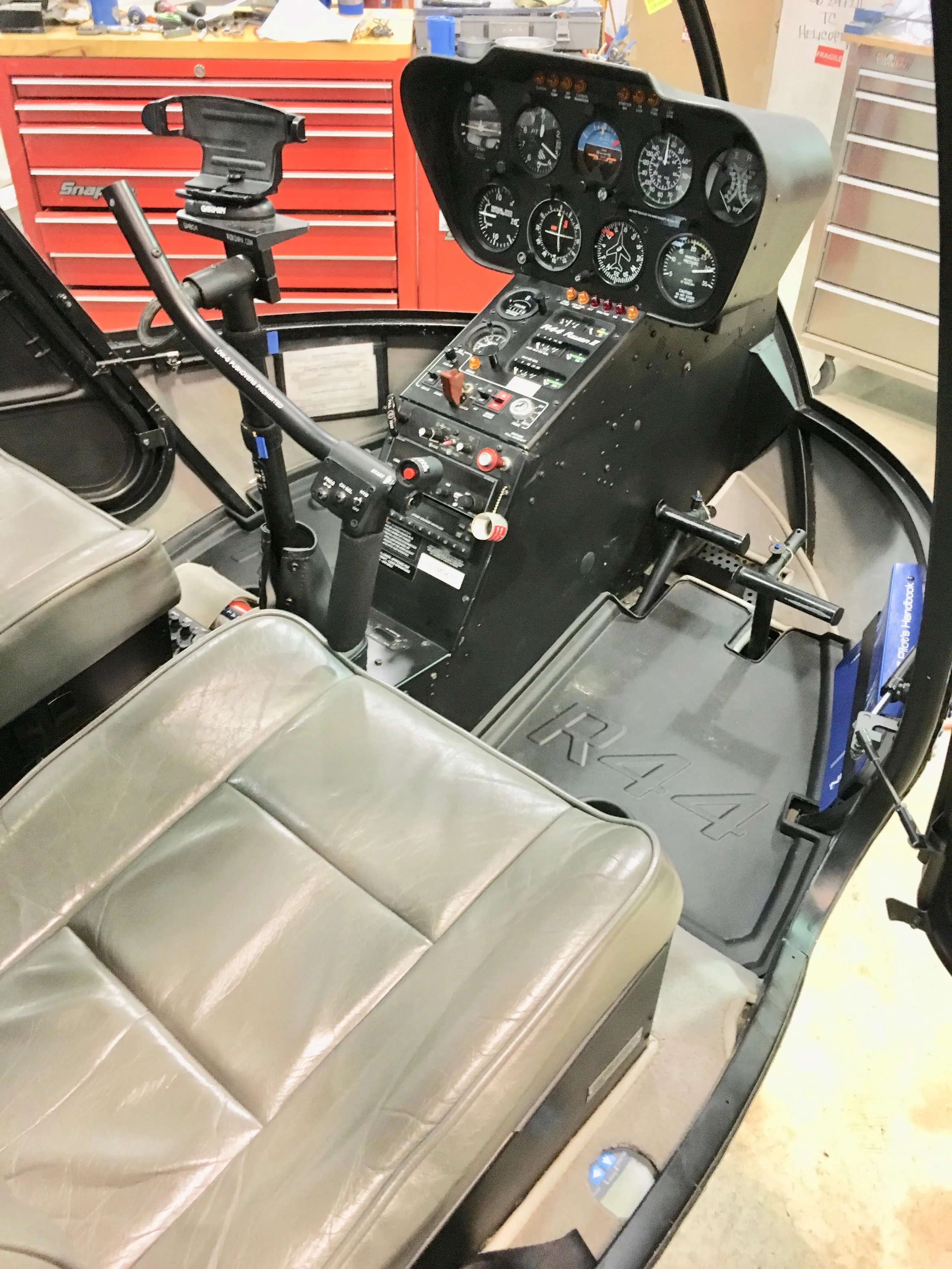 Cockpit and instrument panel of a 2005 Robinson R44 Raven II.
