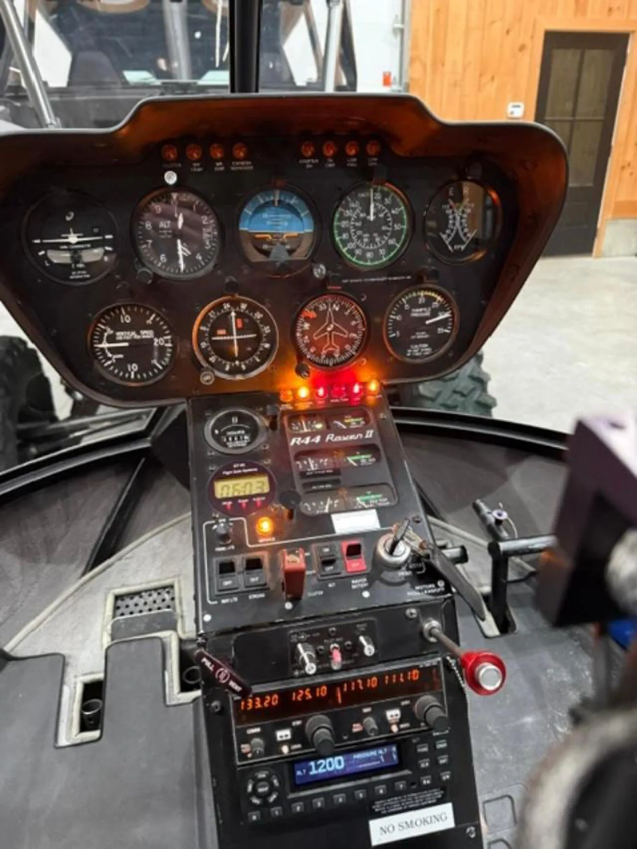 Cockpit and instrument panel of a 2005 Robinson R44 Raven II.