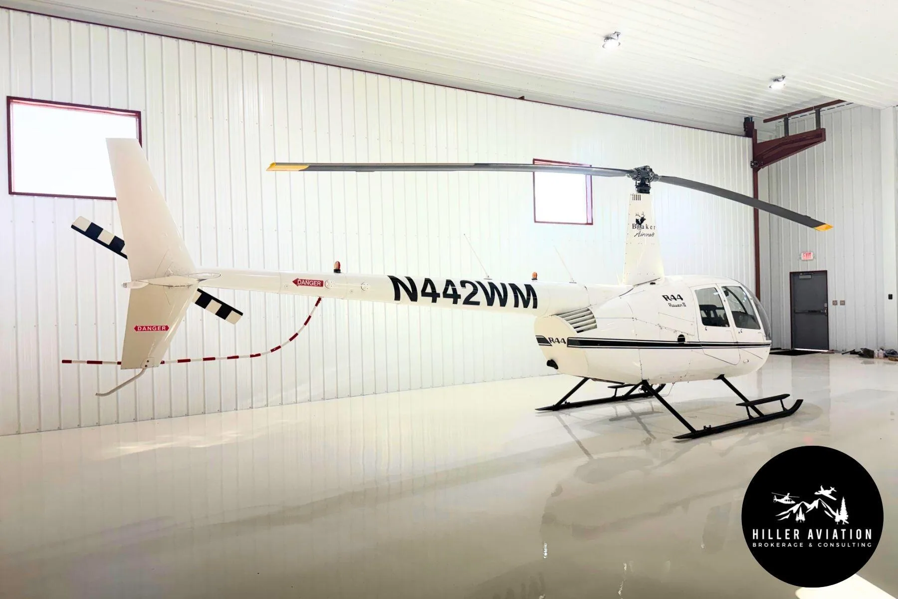 Exterior view of a 2006 Robinson R44 Raven II.