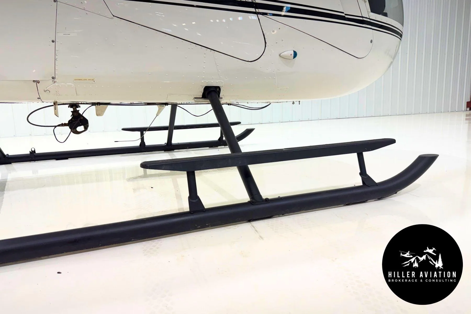 Exterior view of a 2006 Robinson R44 Raven II.