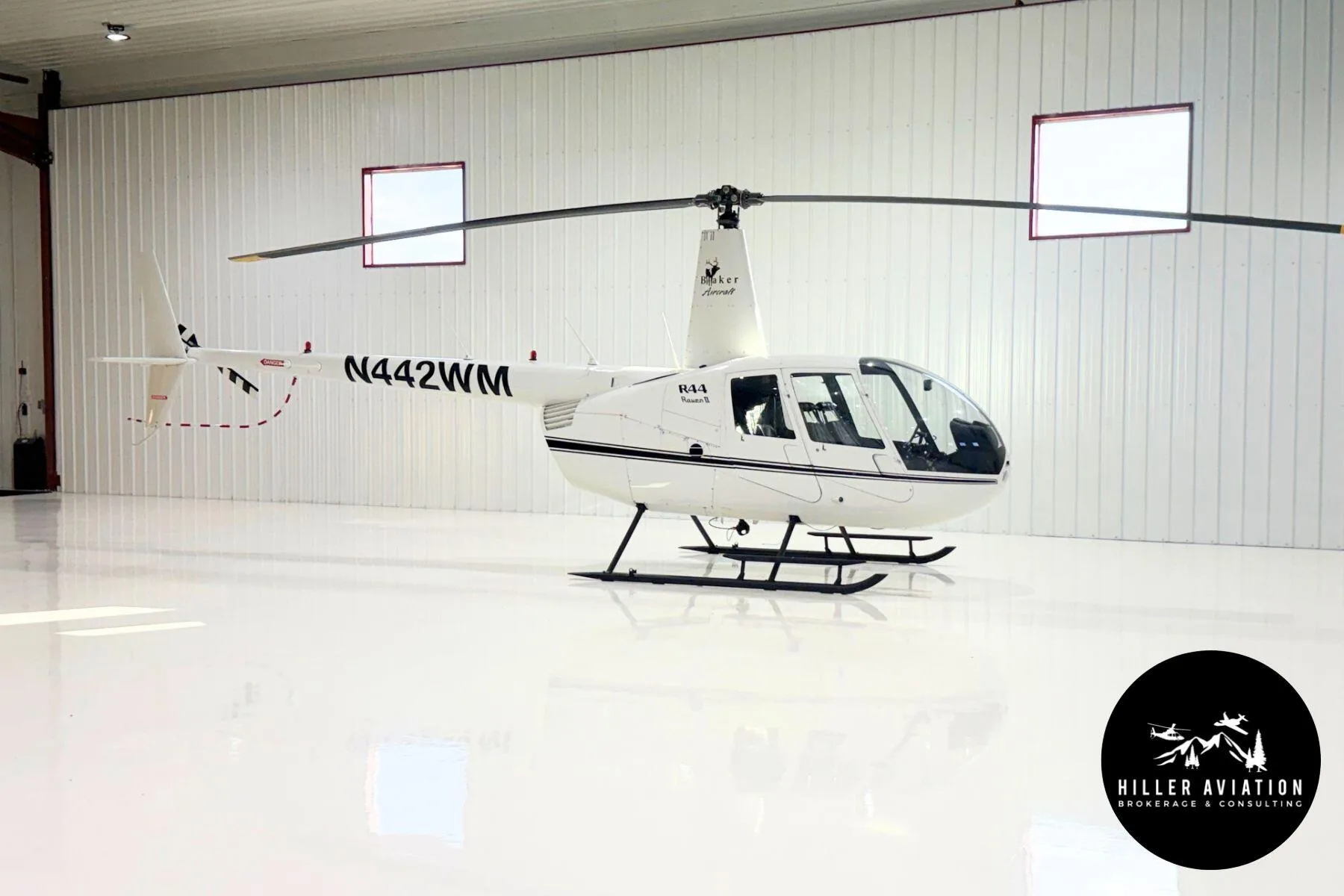 Exterior view of a 2006 Robinson R44 Raven II.