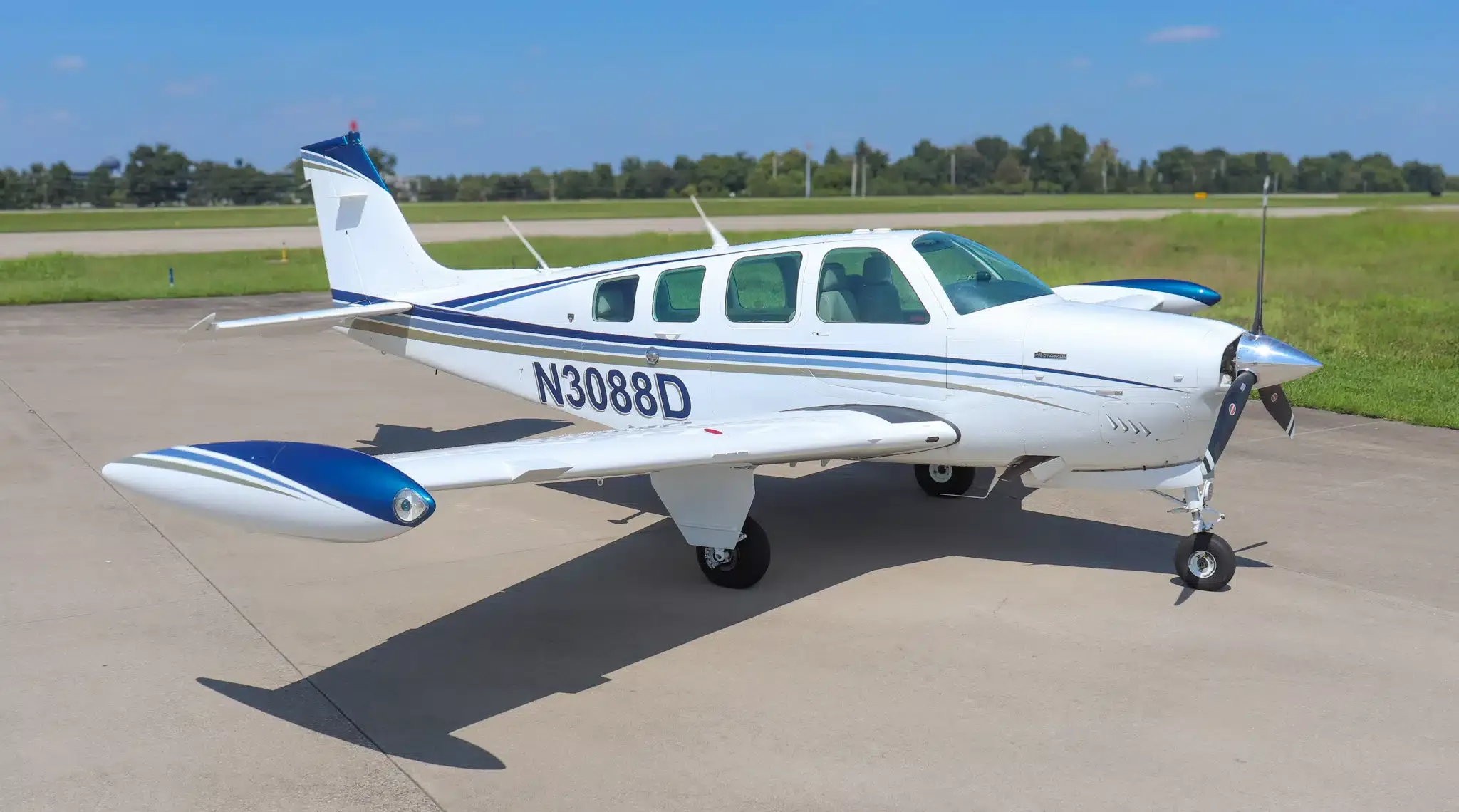 Exterior view of a 1993 Beechcraft Bonanza A36, N232FX.