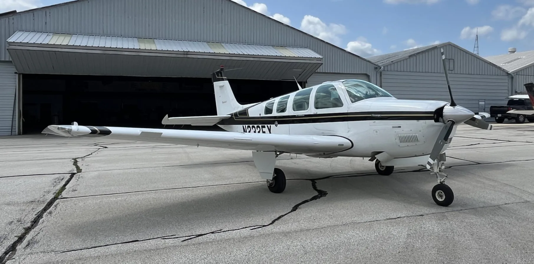 Exterior view of a 1993 Beechcraft Bonanza A36, N232FX.