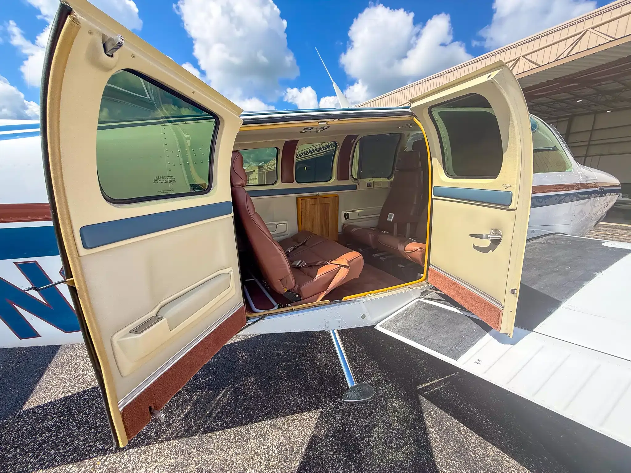 Exterior view of a 1993 Beechcraft Bonanza A36, N8142N.