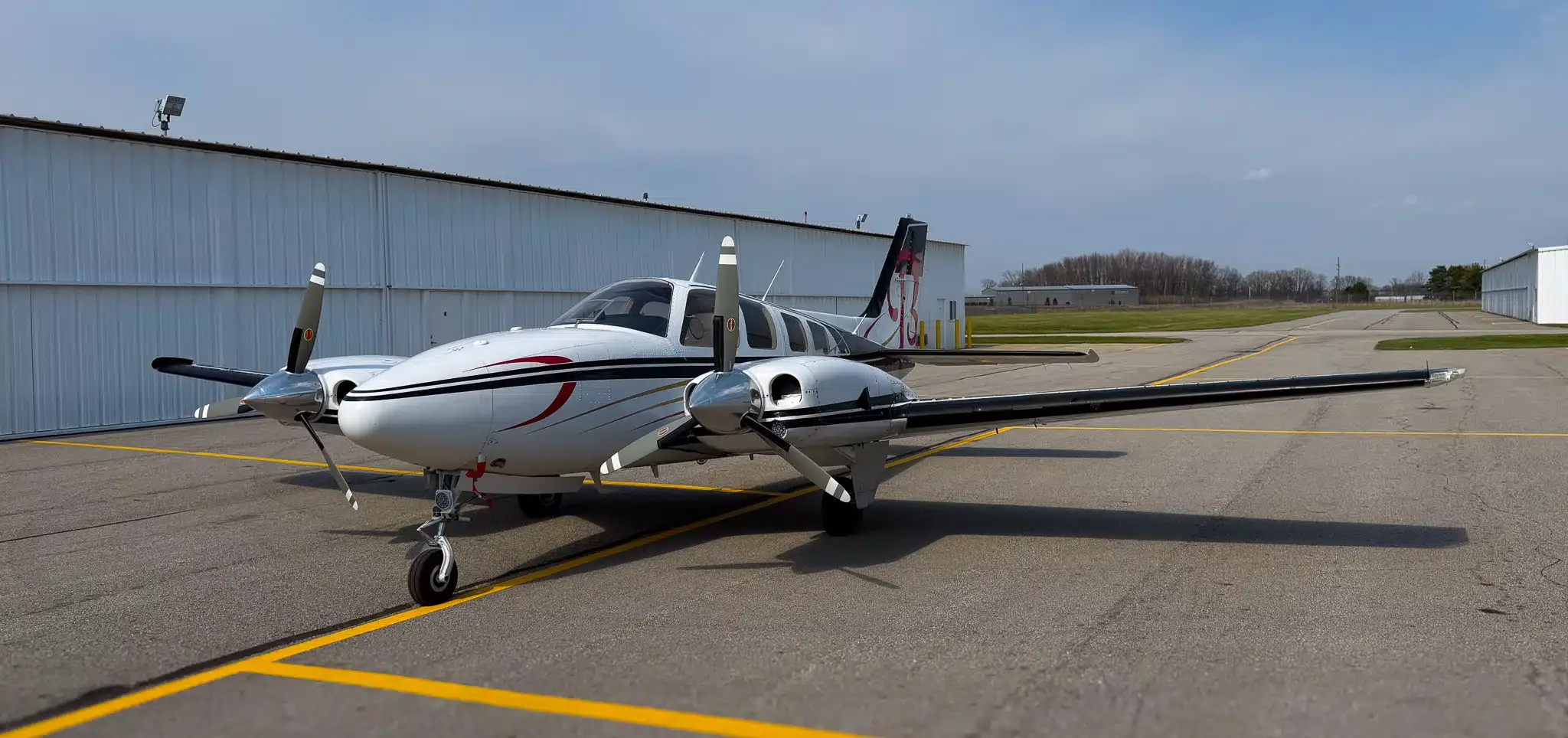 Exterior view of a 1974 Beechcraft B55 Baron, N1159T.