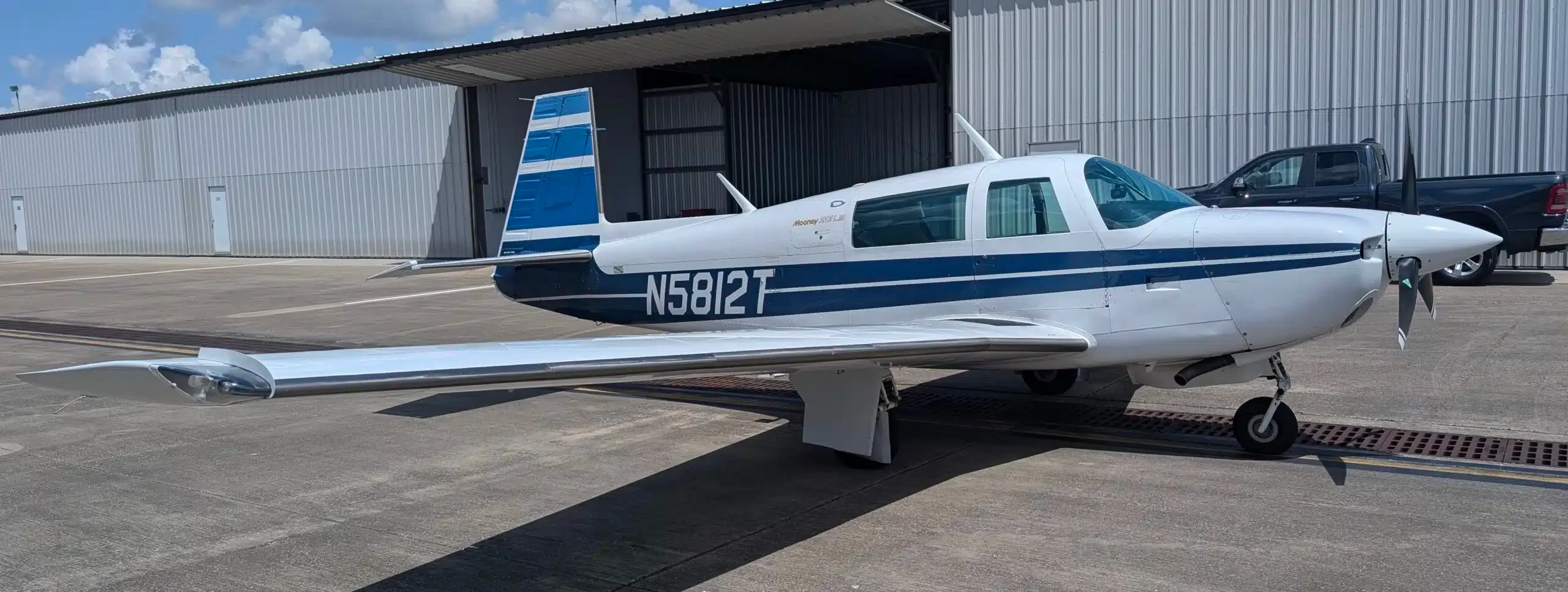 Exterior view of a 1977 Mooney M20J, N201WJ.