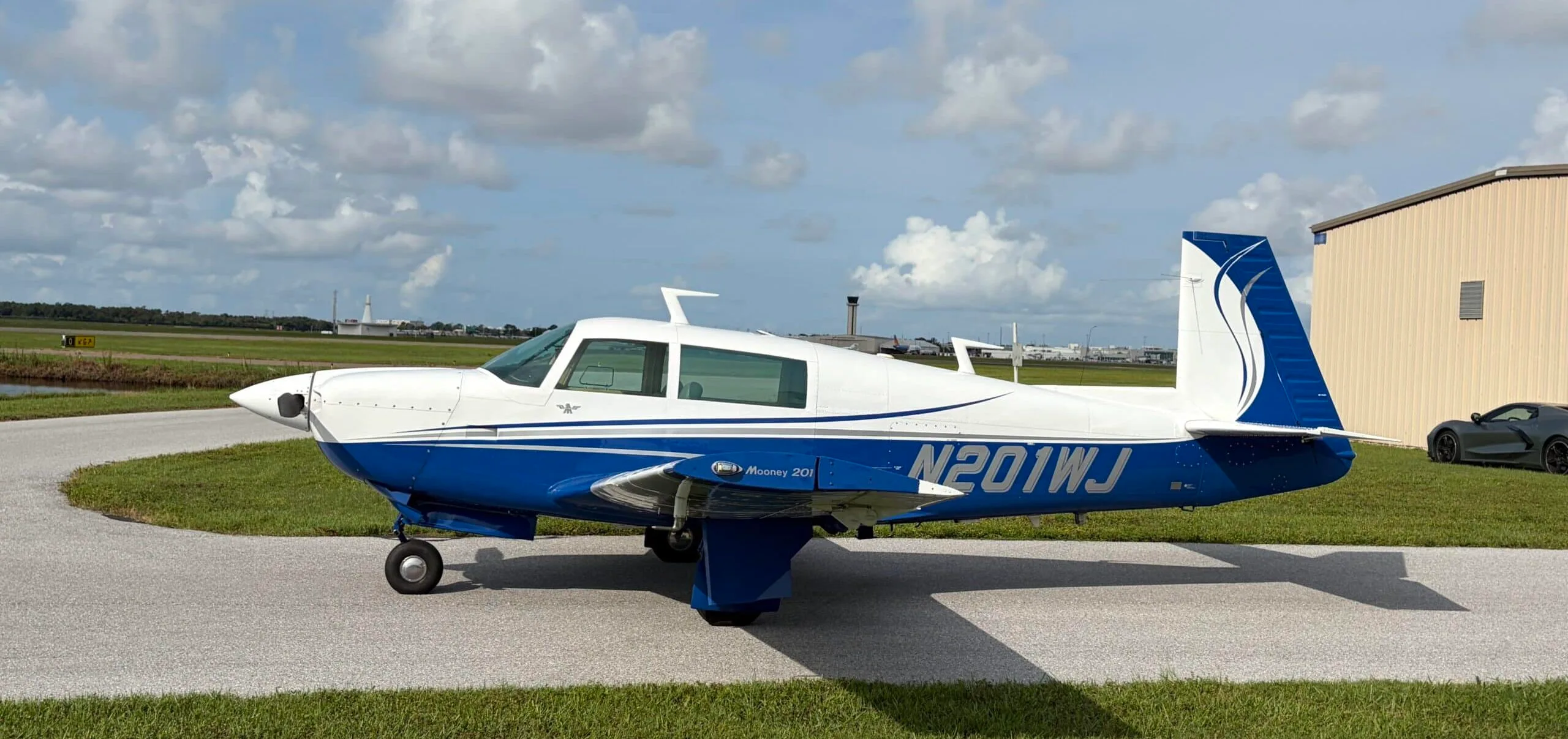Exterior view of a 1977 Mooney M20J, N201WJ.