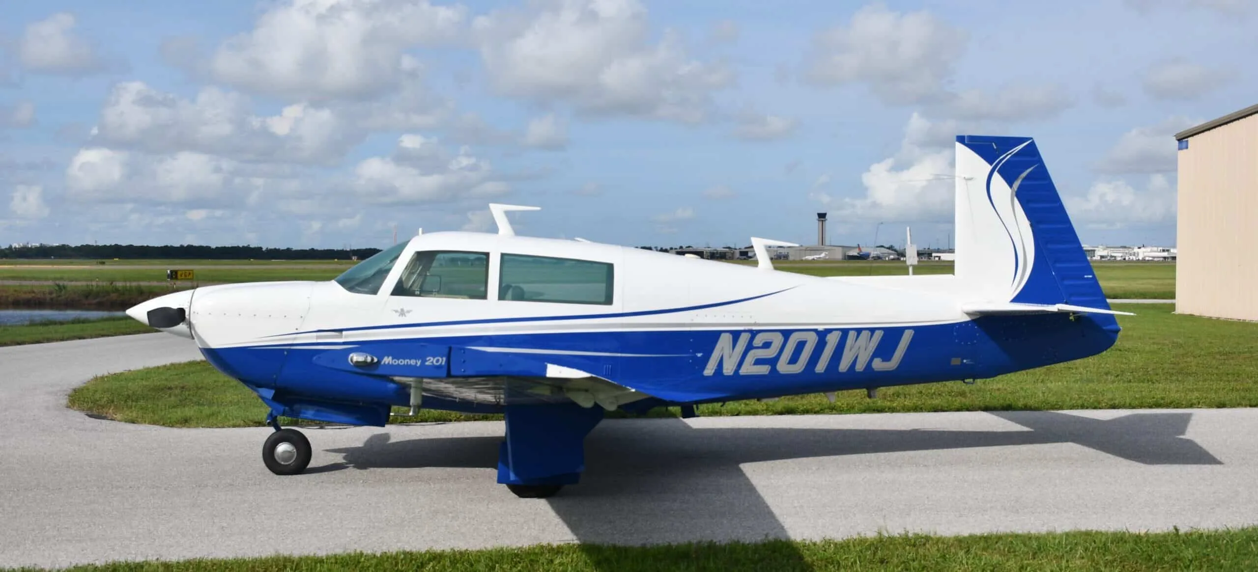Exterior view of a 1977 Mooney M20J, N201WJ.