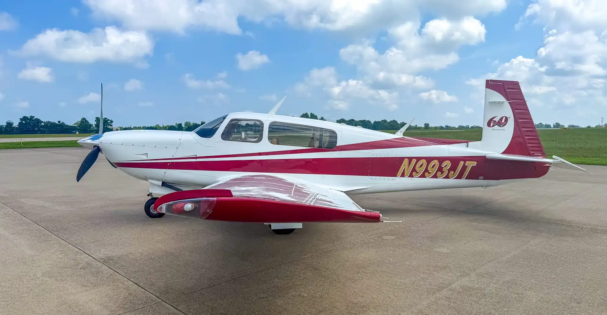 Exterior view of a 1985 Mooney M20J, N5812T.