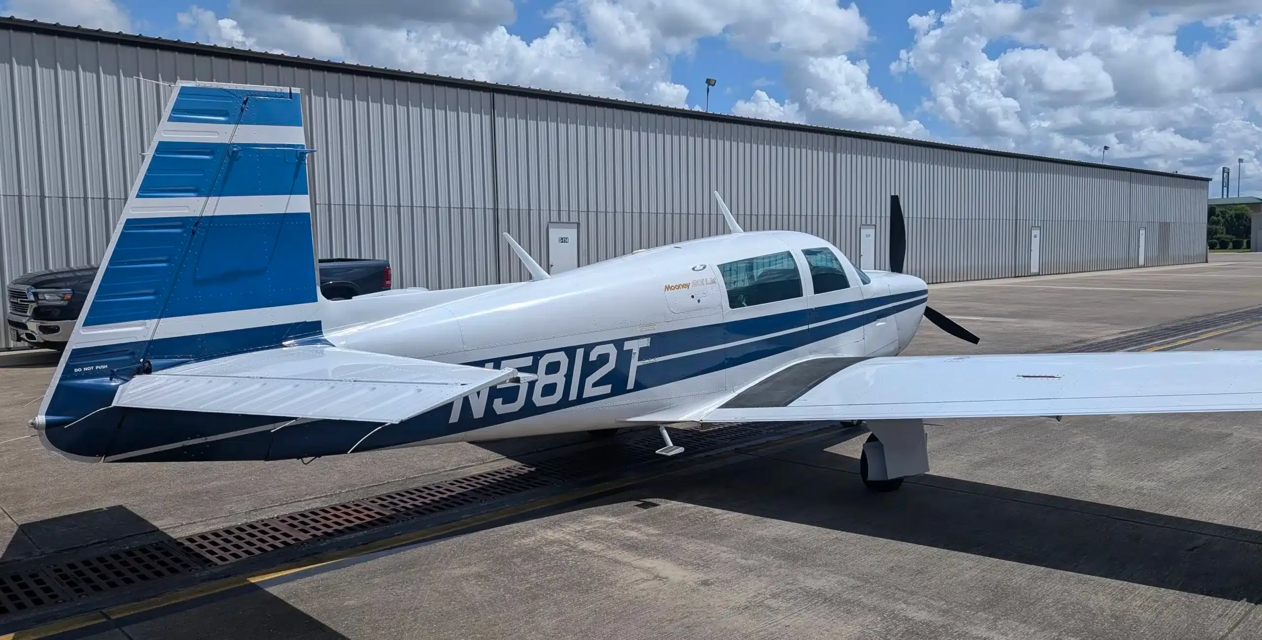 Exterior view of a 1985 Mooney M20J, N5812T.