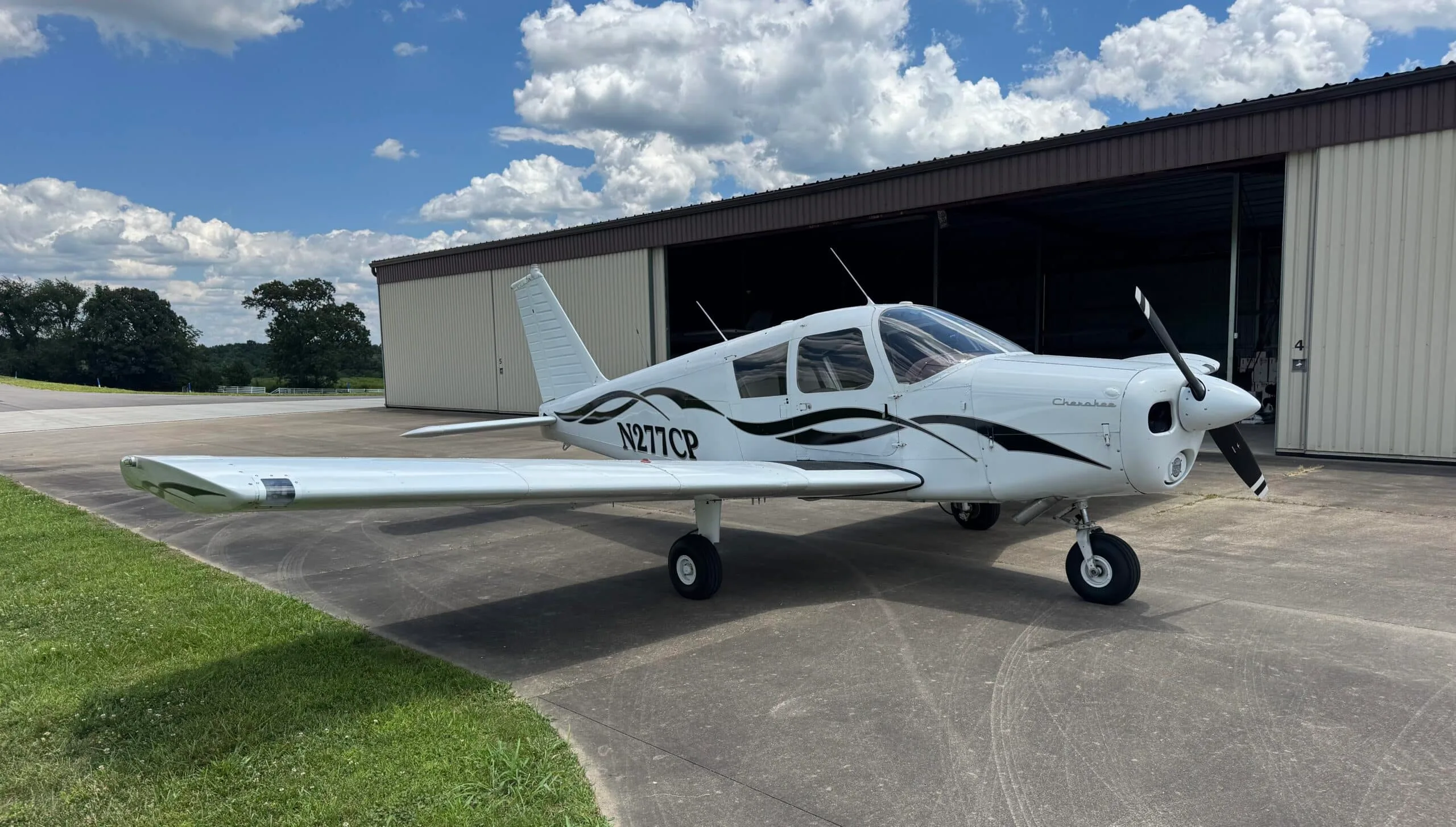 Exterior view of a 1961 Piper Cherokee 160, N277CP.