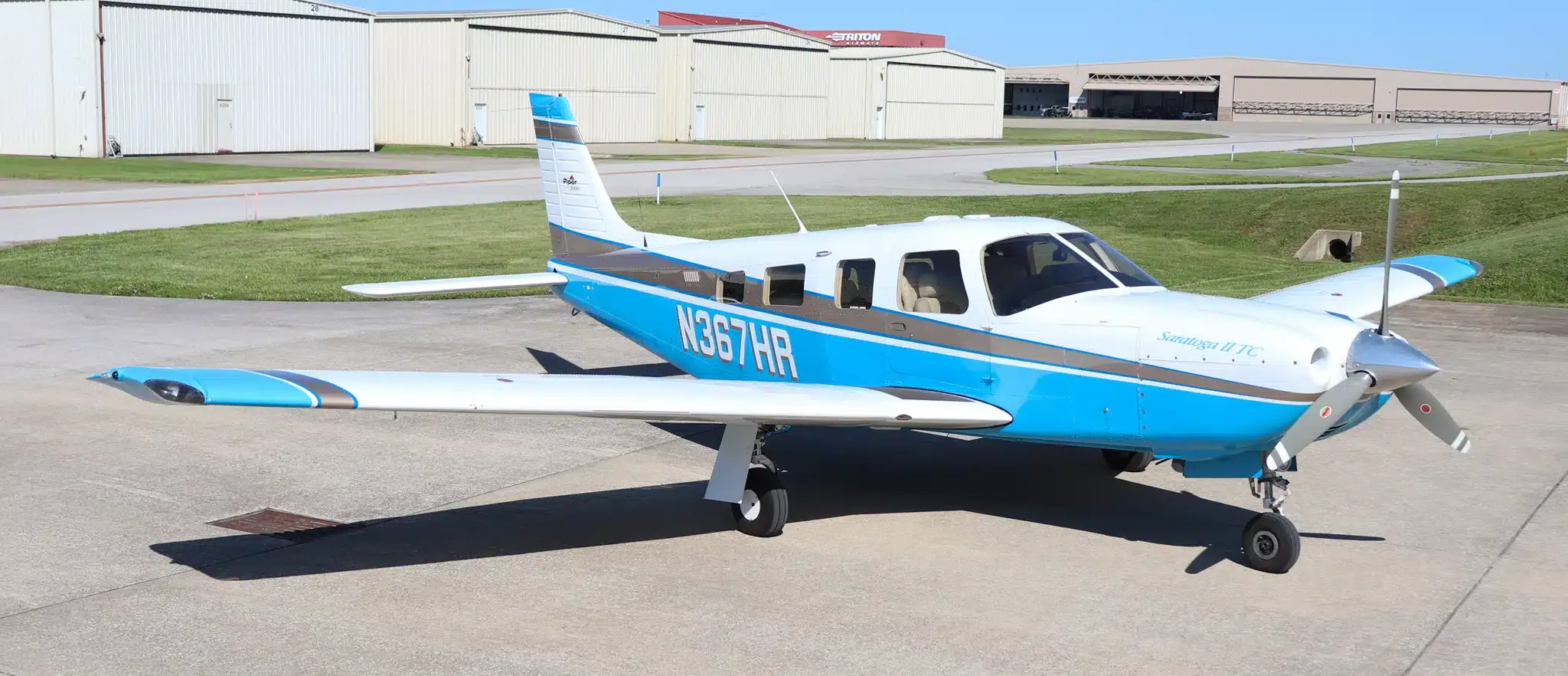 Exterior view of a 1999 Piper Saratoga II TC, N41322.