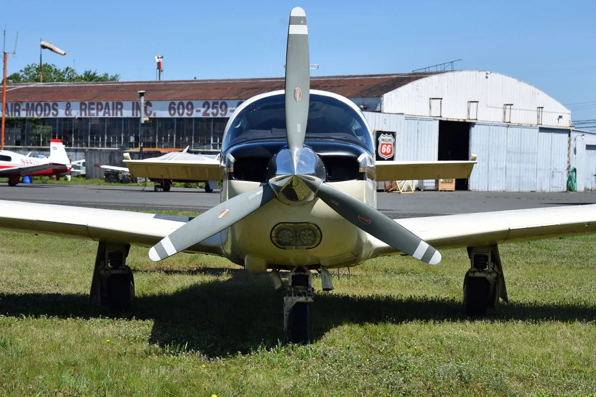 Exterior view of a 1979 Mooney M20K 231 ’80, N231HE.