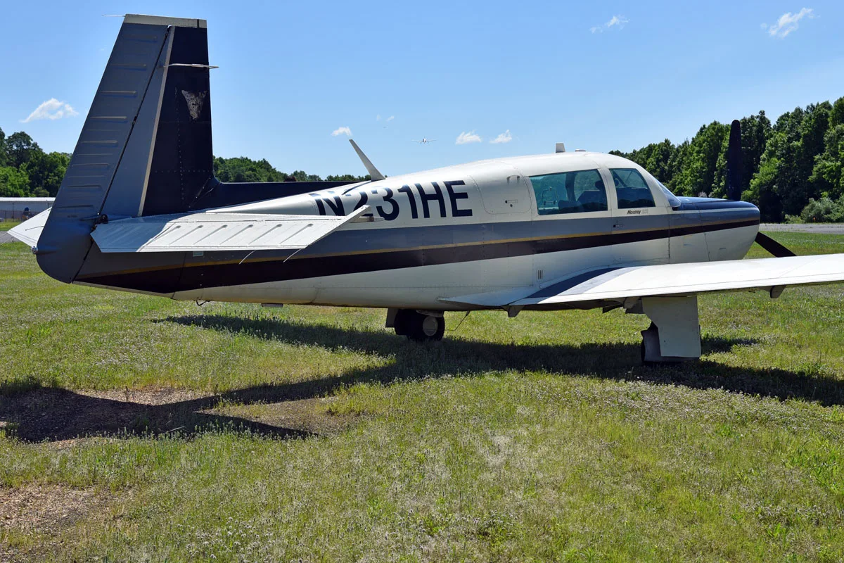 Exterior view of a 1979 Mooney M20K 231 ’80, N231HE.