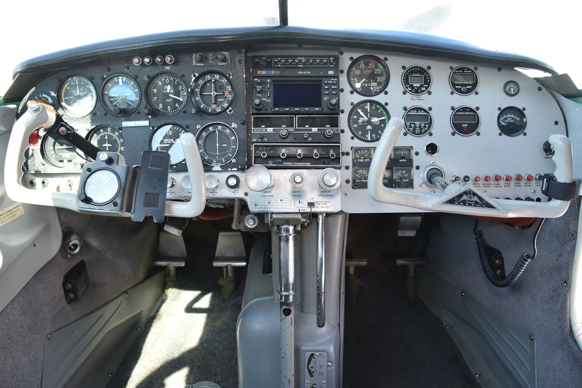 Cockpit and instrument panel of a 1966 Mooney M20C.