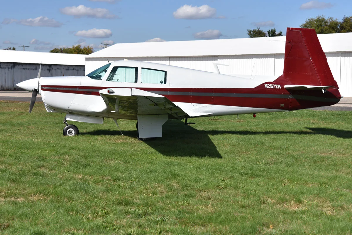 Exterior view of a 1966 Mooney M20C, N2672W.