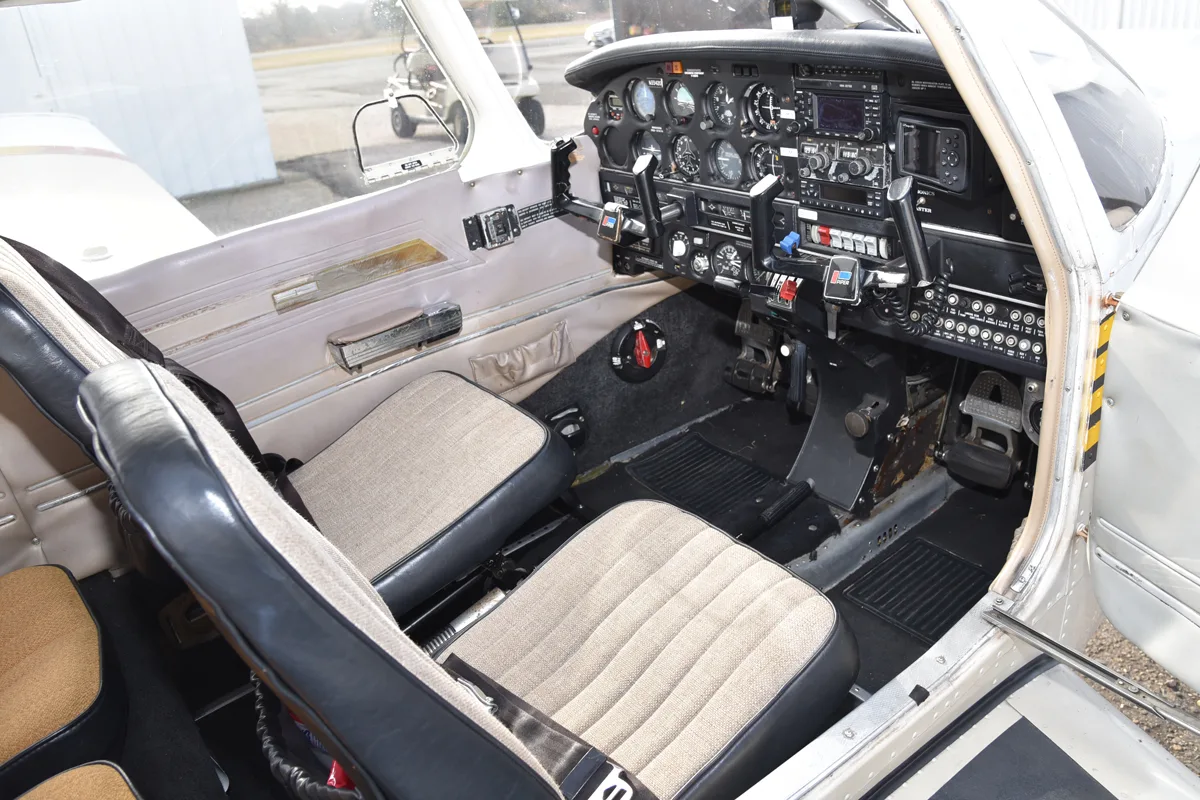 Cockpit and instrument panel of a 1975 Piper PA-28R-200 Arrow II.