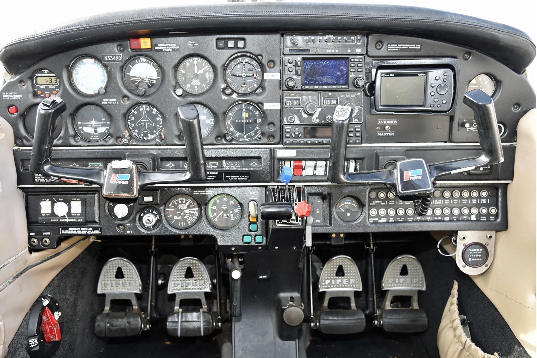 Cockpit and instrument panel of a 1975 Piper PA-28R-200 Arrow II.
