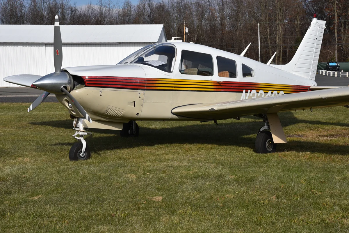 Exterior view of a 1975 Piper PA-28R-200 Arrow II, N33420.