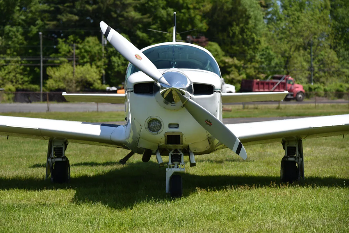 Exterior view of a 1966 Mooney M20E Super 21, N3479X.