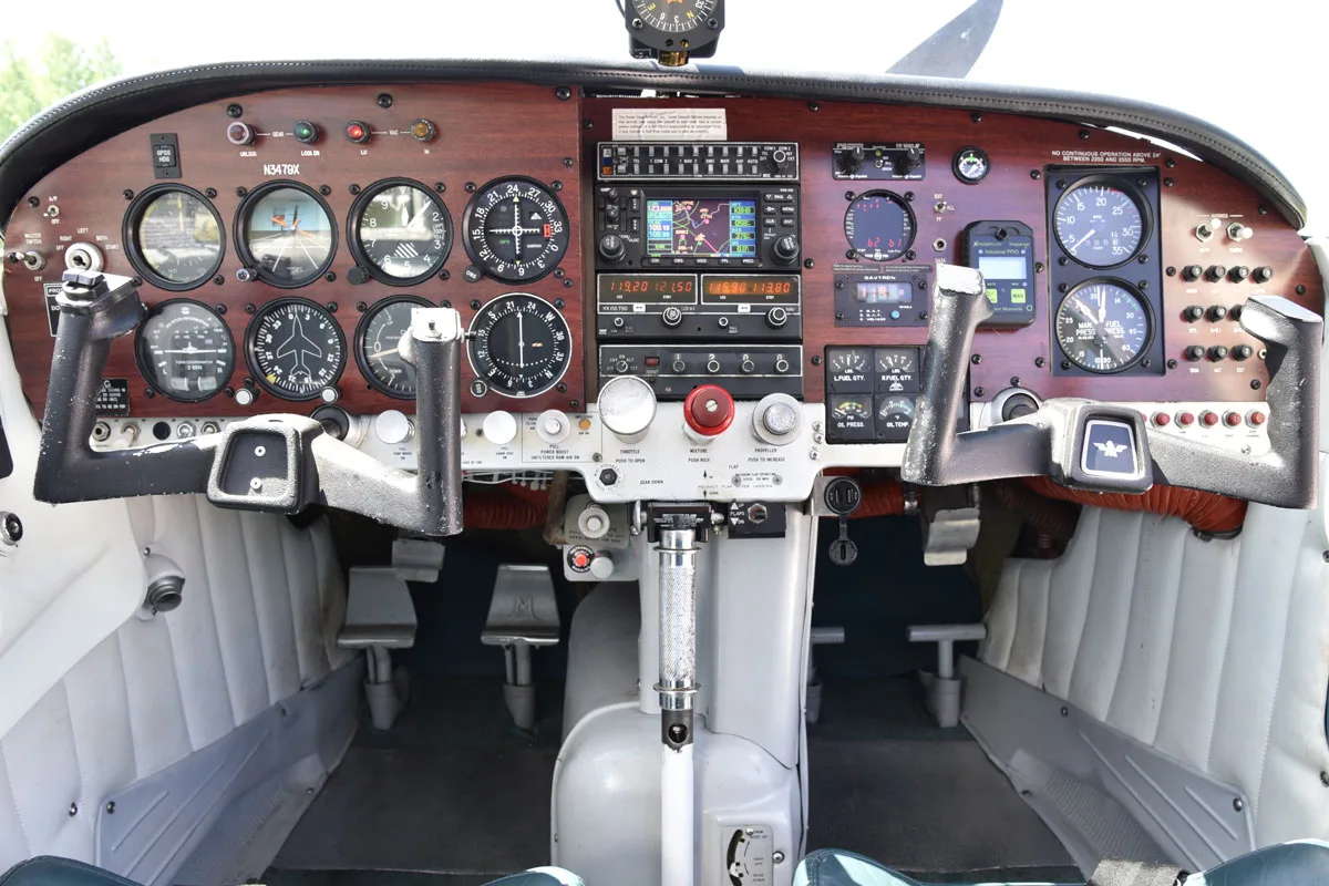 Cockpit and instrument panel of a 1966 Mooney M20E Super 21.