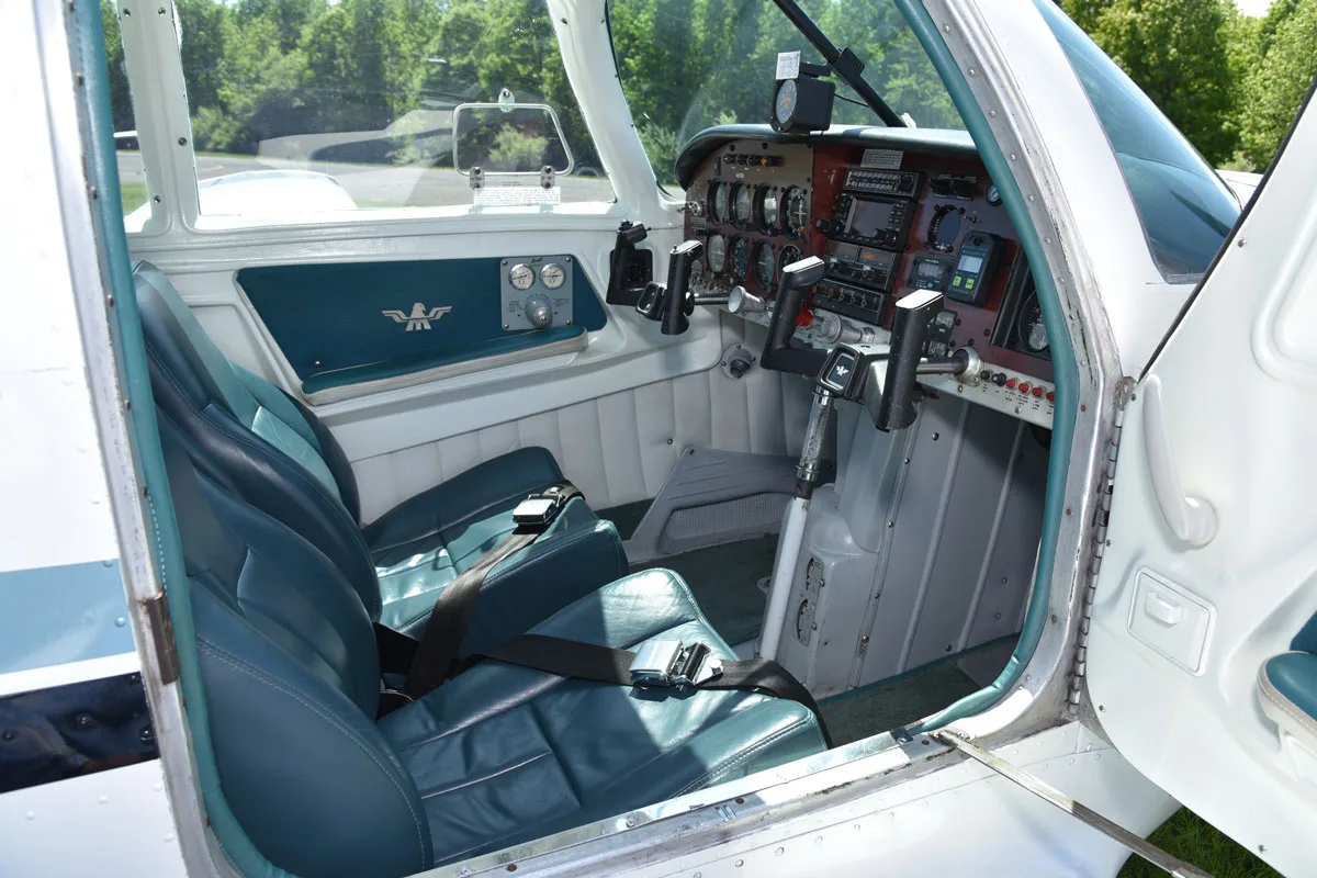 Cockpit and instrument panel of a 1966 Mooney M20E Super 21.
