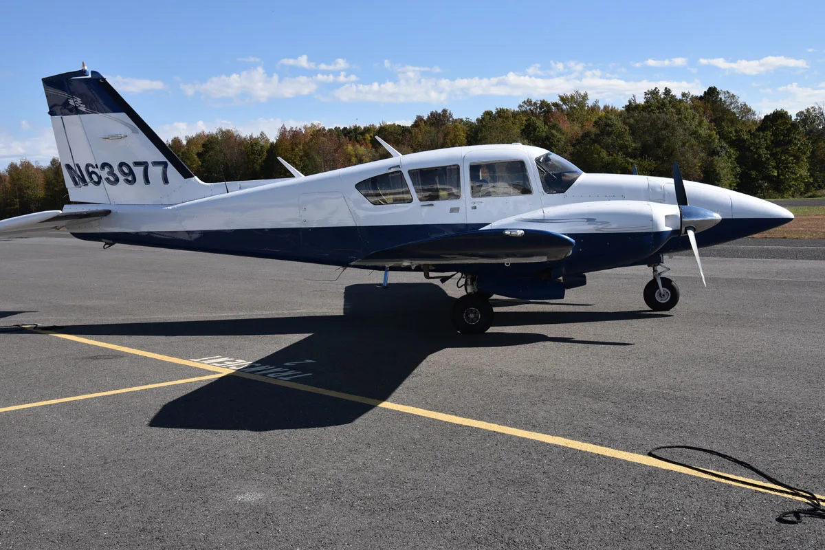 Exterior view of a 1978 Piper Aztec F, N63977.