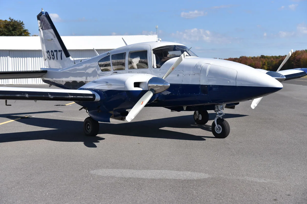 Exterior view of a 1978 Piper Aztec F, N63977.