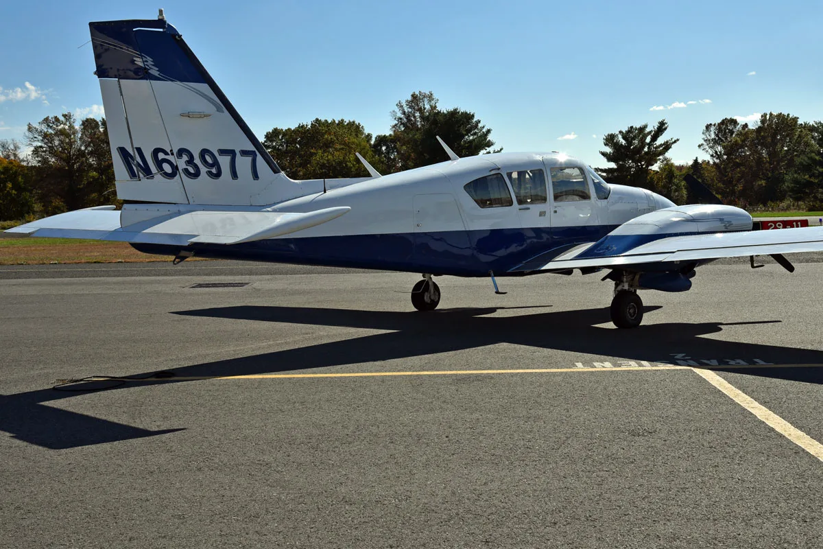 Exterior view of a 1978 Piper Aztec F, N63977.
