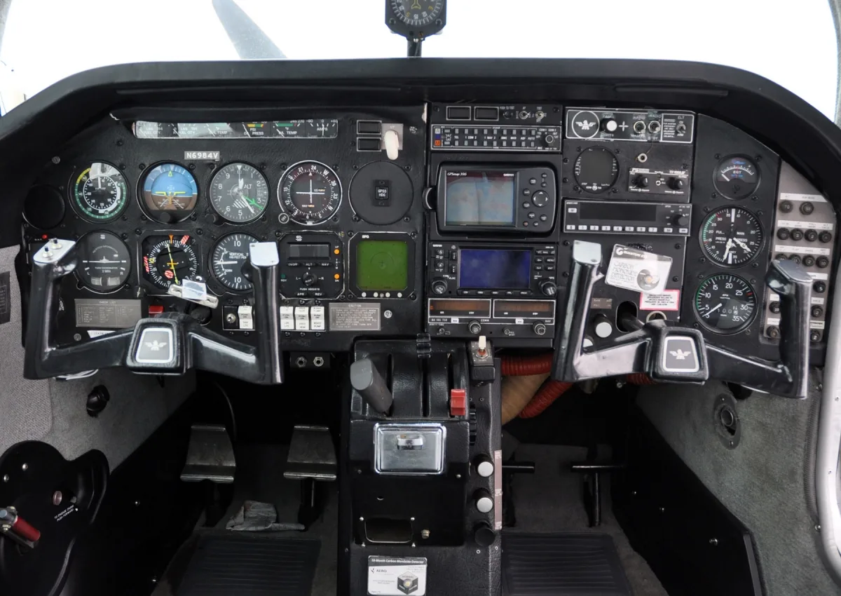Cockpit and instrument panel of a 1976 Mooney M20F Executive.