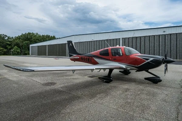 Exterior view of a 2025 Cirrus SR22T-G7, N44MV.