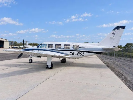 Exterior view of a 1979 Piper Navajo Chieftain PA-31-350, C6-BSL.