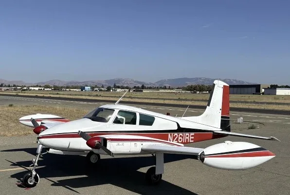 Exterior view of a 1956 Cessna 310, N261RE.