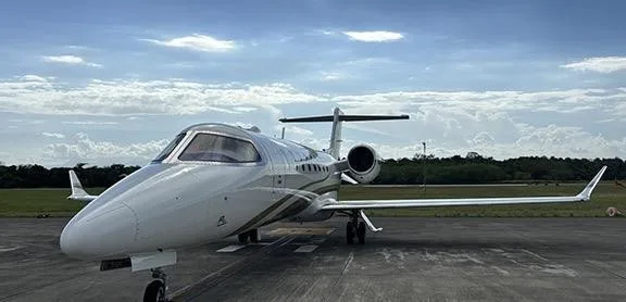 Exterior view of a 2020 Learjet 75, N309MS.