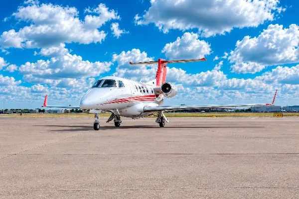 Exterior view of a 2020 Embraer Phenom 300.