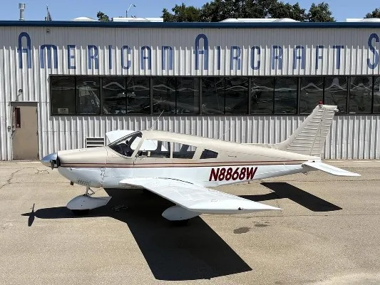 Exterior view of a 1964 Piper Cherokee 235, N8868W.