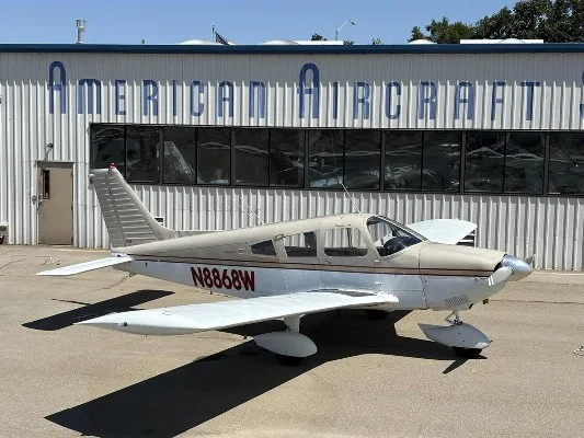 Exterior view of a 1964 Piper Cherokee 235, N8868W.