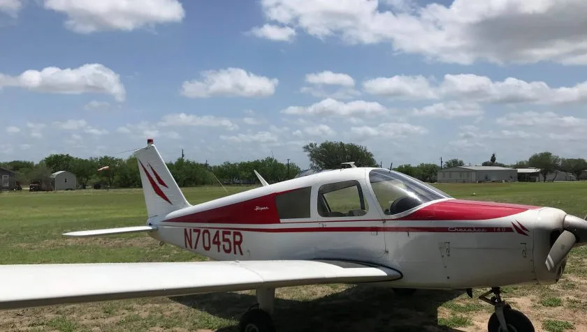 Exterior view of a 1966 Piper Cherokee 28-21742, N7045R.