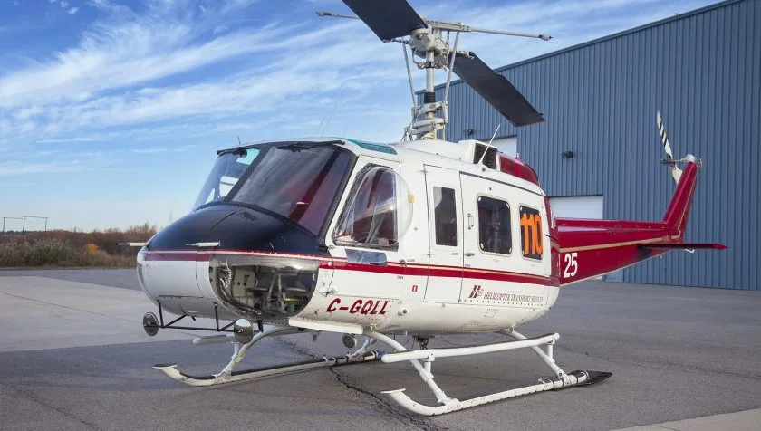Exterior view of a 1968 Bell 205A1 30018, C-GQLL.