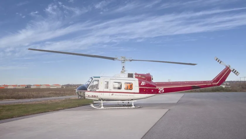 Exterior view of a 1968 Bell 205A1 30018, C-GQLL.