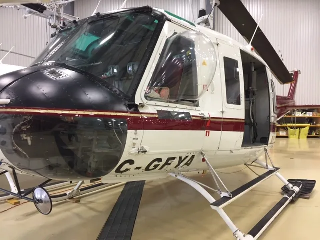 Exterior view of a 1968 Bell 205A1 30060, C-GFYA.